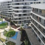 شقة للبيع غرفتين نص تشطيب في كمبوند بالتقسيط في مستقبل سيتي