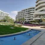 شقة للبيع غرفتين نص تشطيب في كمبوند بالتقسيط في مستقبل سيتي